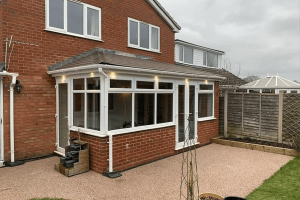 White uPVC conservatory with tiled roof